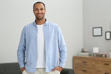 Photo of Portrait of handsome young man at home