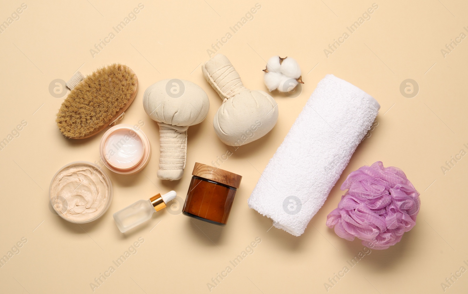 Photo of Bath accessories. Flat lay composition with personal care products on beige background