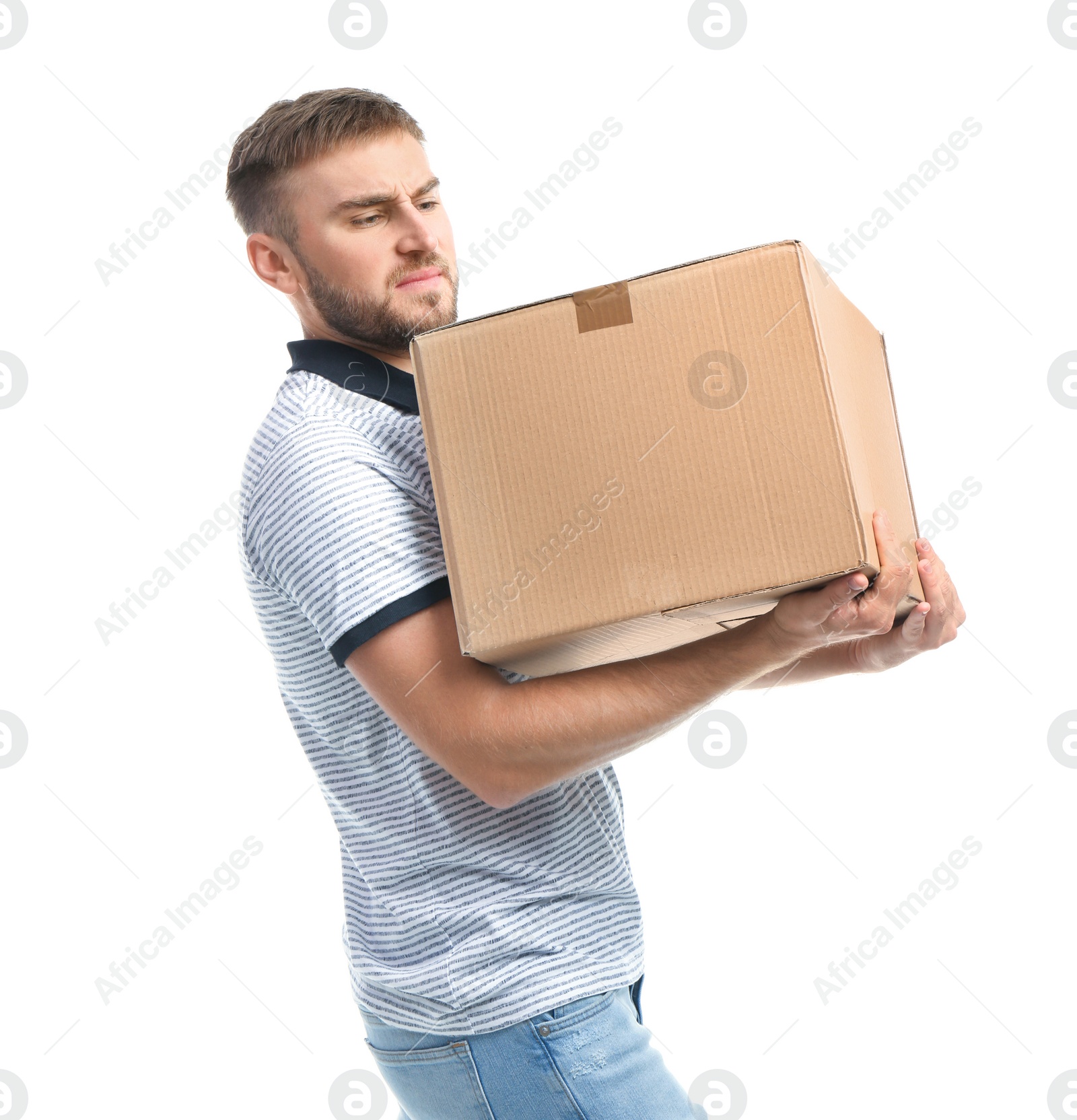 Photo of Portrait of young man carrying carton box on white background. Posture concept