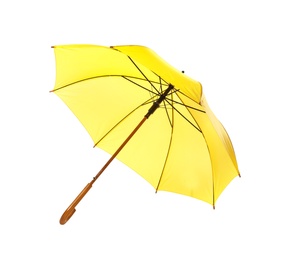 Photo of Modern opened yellow umbrella isolated on white