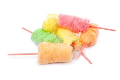 Photo of Straws with yummy cotton candy on white background