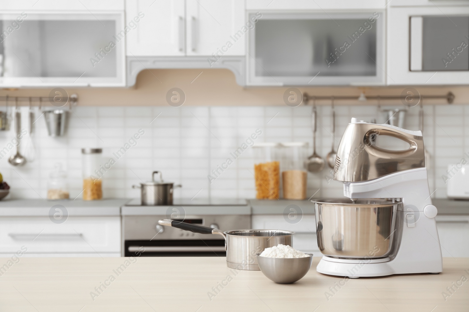 Photo of Houseware and blurred view of kitchen interior on background