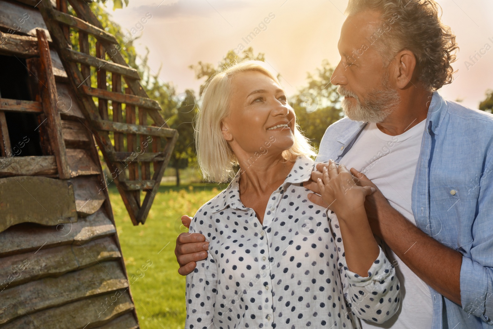 Photo of Lovely mature couple spending time together in park