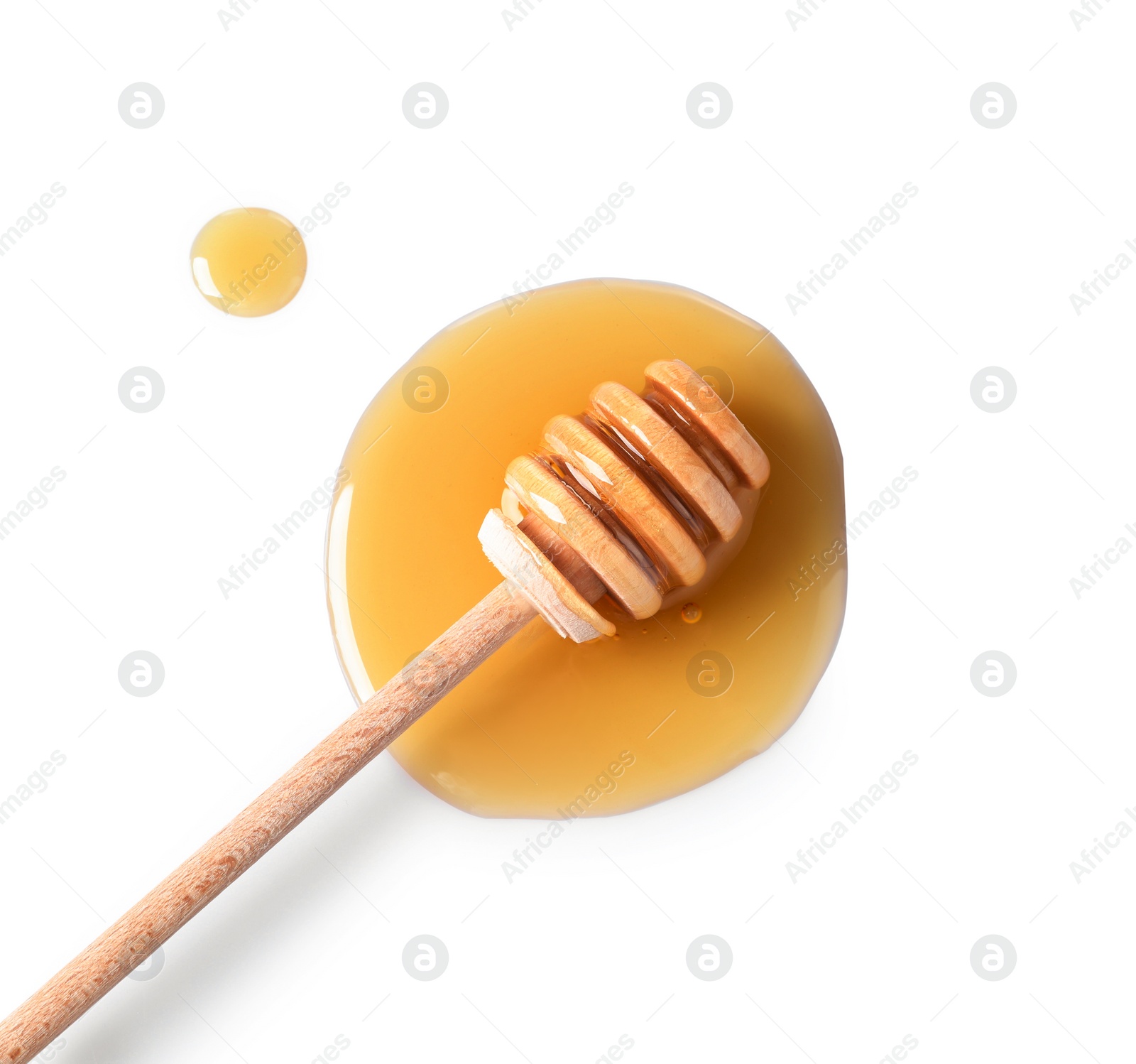 Photo of Wooden dipper and fresh honey on white background, top view