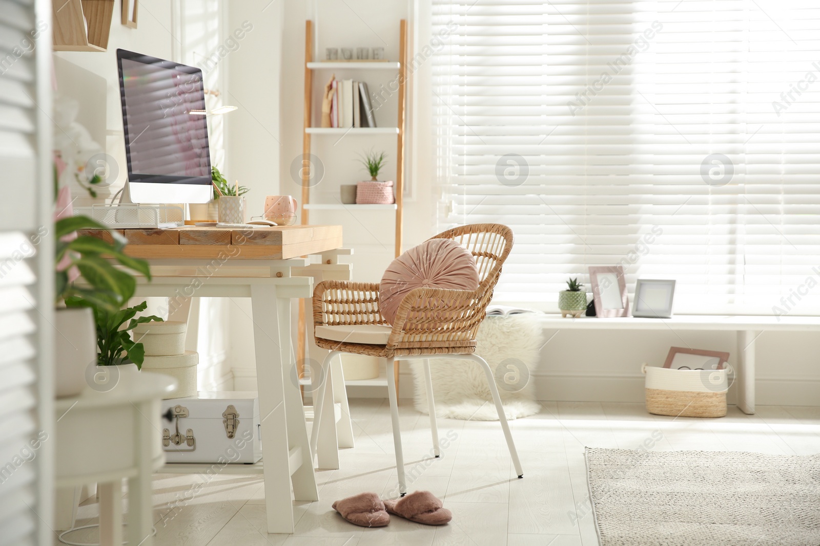 Photo of Stylish home office interior with comfortable workplace