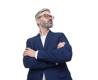 Mature businessman in stylish clothes posing on white background, low angle view