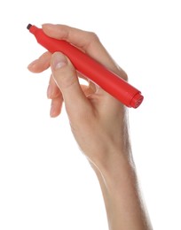 Woman holding red marker on white background, closeup