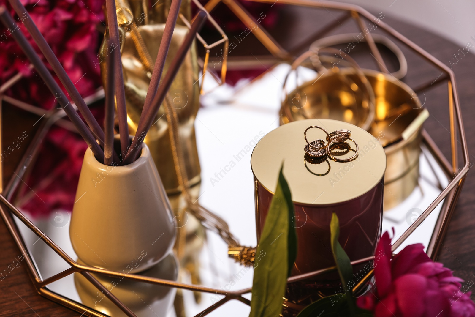 Photo of Composition with stylish accessories and interior elements on table, closeup