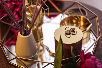 Photo of Composition with stylish accessories and interior elements on table, closeup