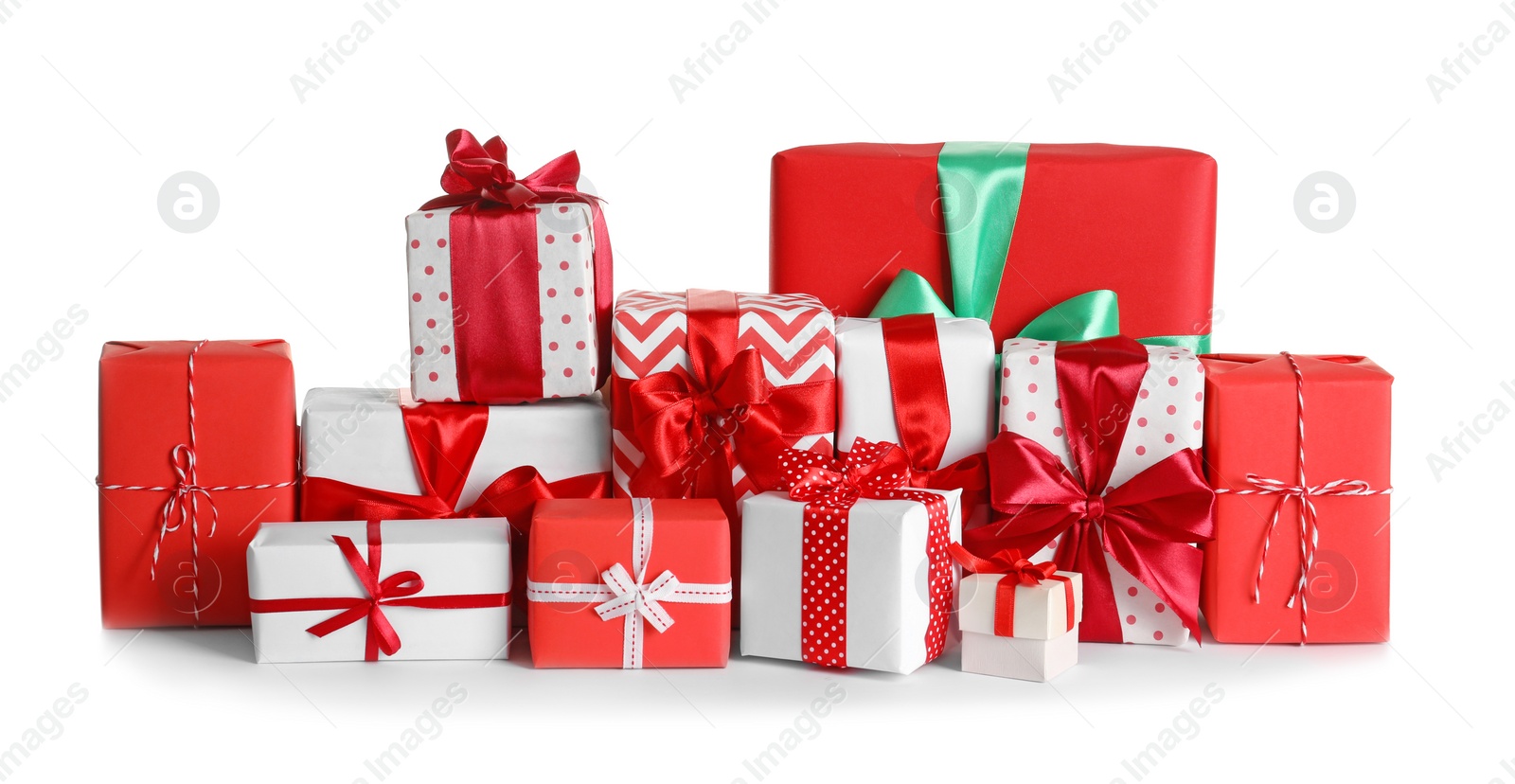 Photo of Beautifully wrapped gift boxes on white background