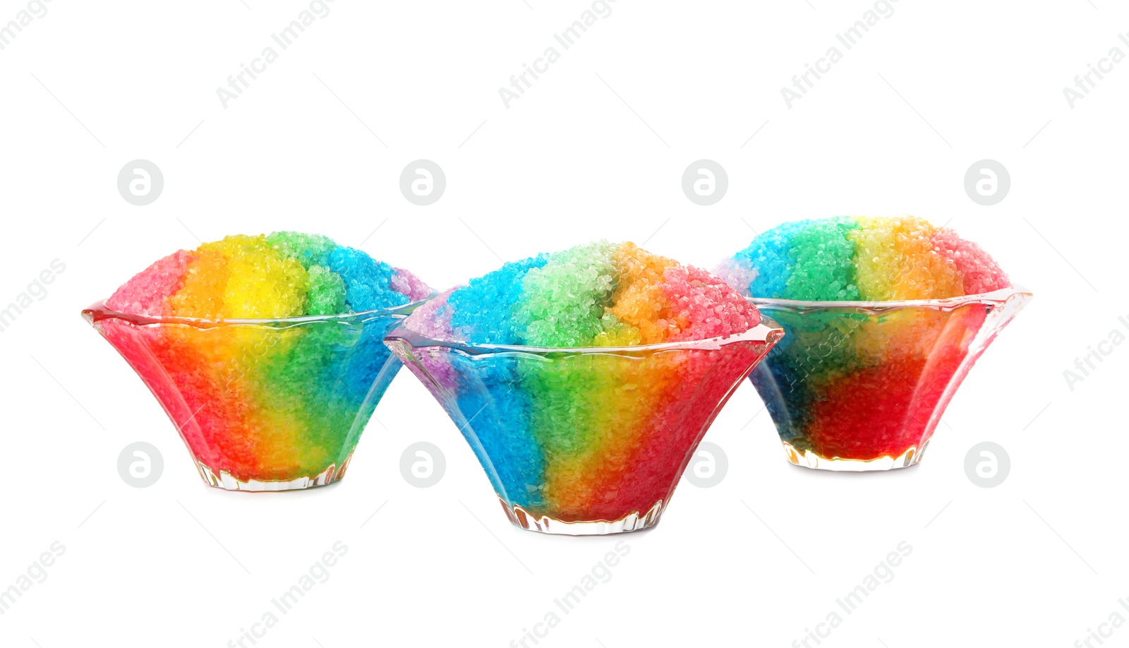 Photo of Rainbow shaving ice in glass dessert bowls isolated on white