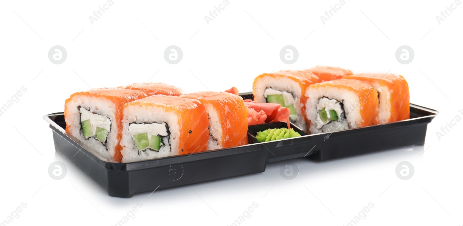 Photo of Box with tasty sushi rolls on white background. Food delivery