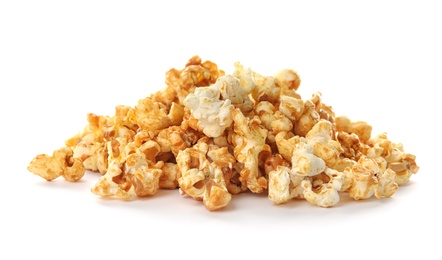 Photo of Pile of delicious caramel popcorn on white background