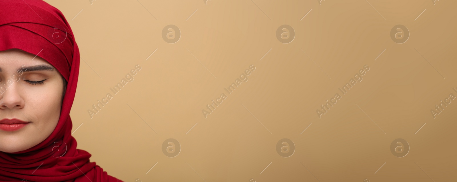 Image of Portrait of Muslim woman in hijab on beige background, space for text. Banner design