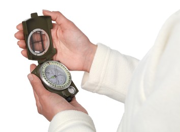 Photo of Woman holding compass on white background, closeup