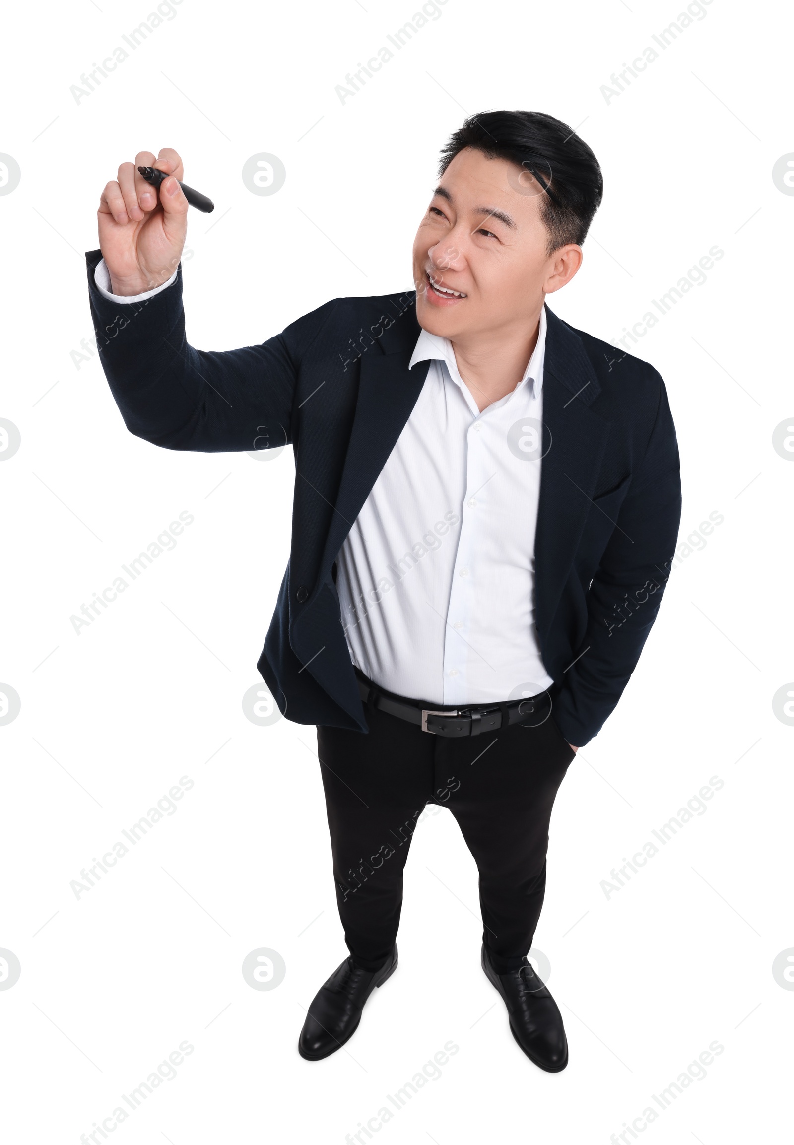 Photo of Businessman in suit with marker writing on white background, above view