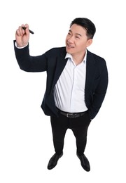 Businessman in suit with marker writing on white background, above view