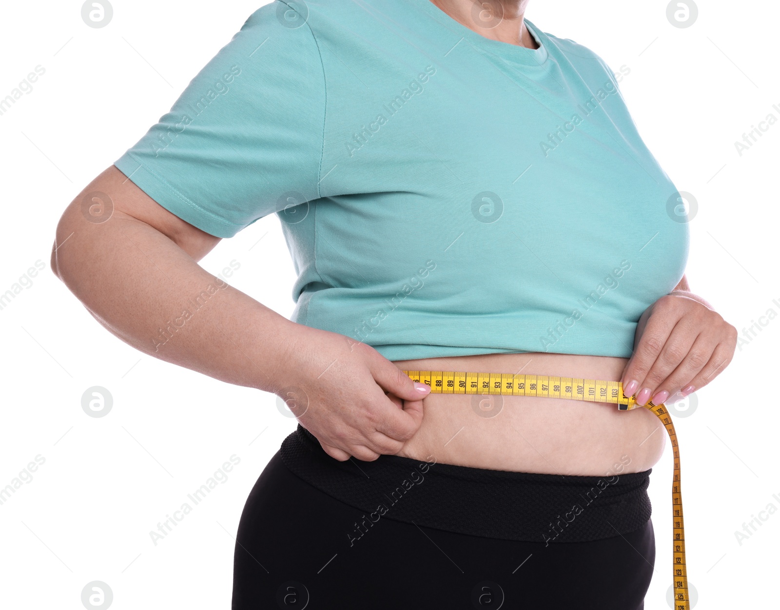 Photo of Overweight woman measuring waist with tape on white background, closeup