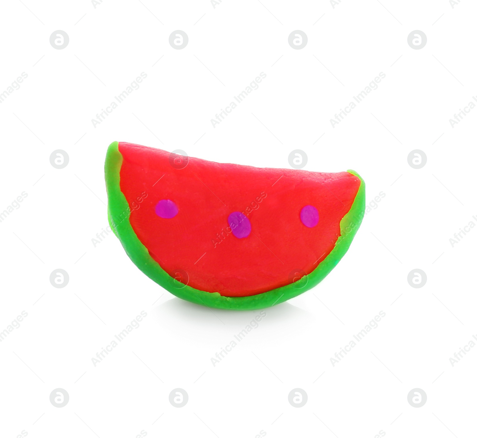 Photo of Small watermelon made from play dough on white background