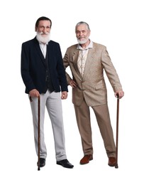 Senior men with walking canes on white background