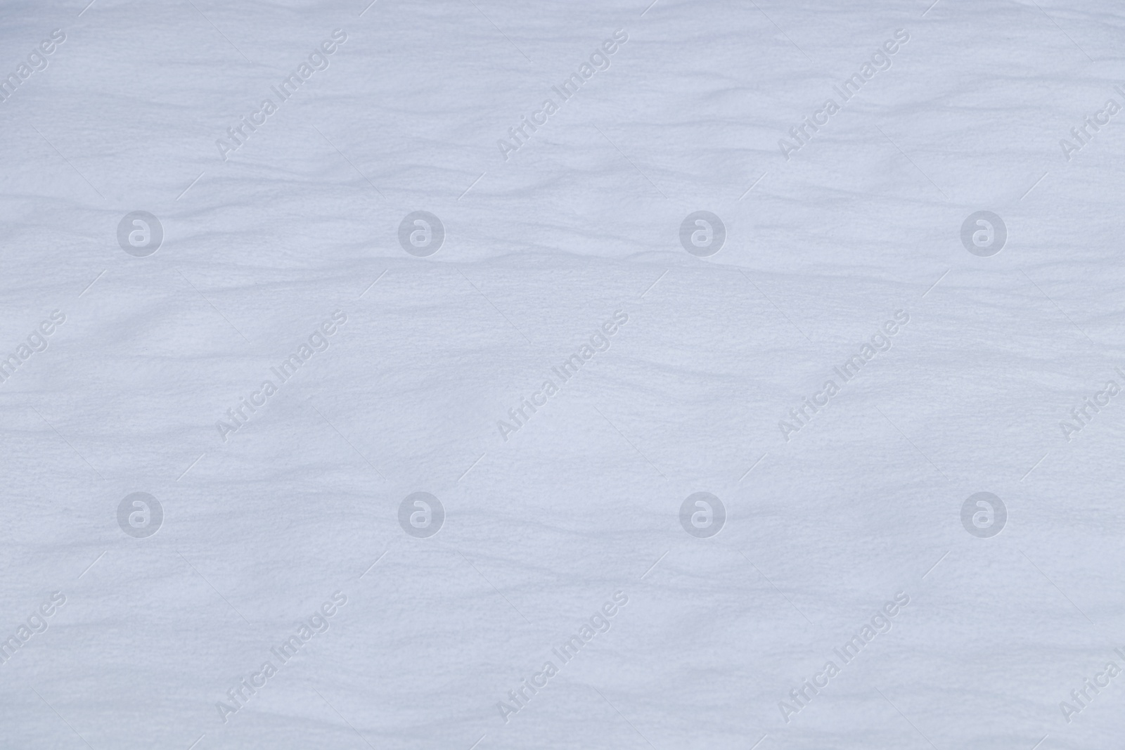 Photo of Beautiful shiny snow as background, closeup view