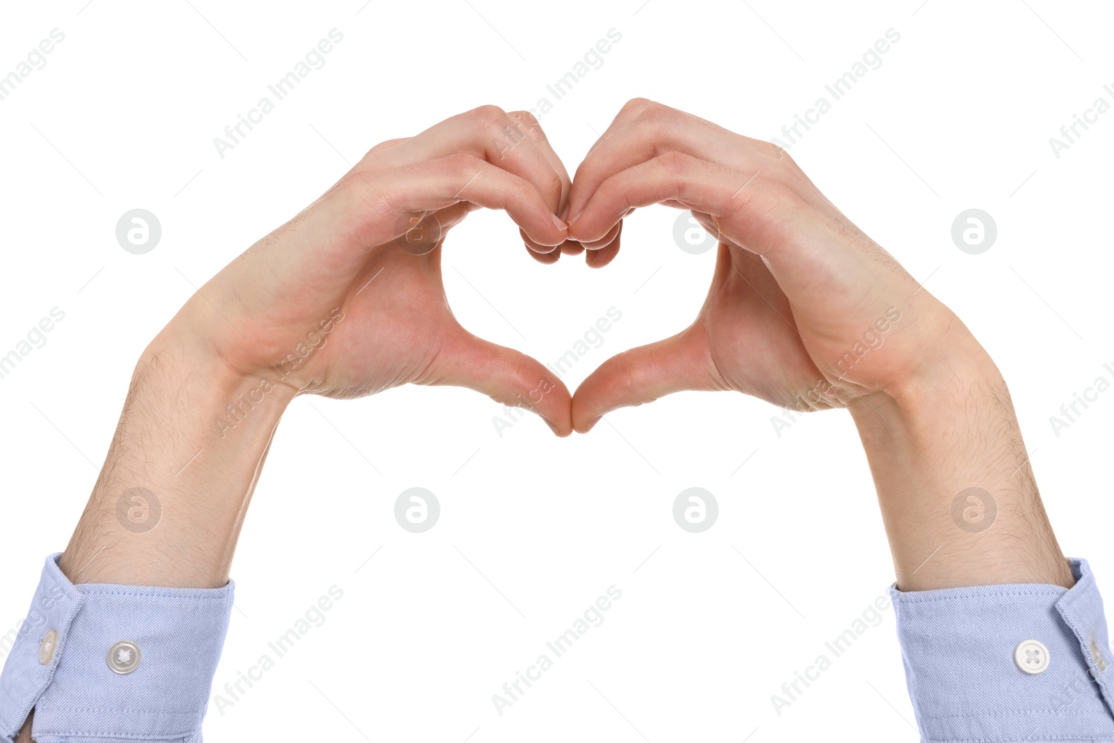 Photo of Man showing heart gesture with hands on white background, closeup