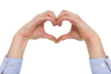 Man showing heart gesture with hands on white background, closeup