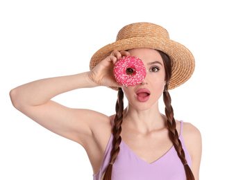 Beautiful young woman wearing stylish hat with donut on white background