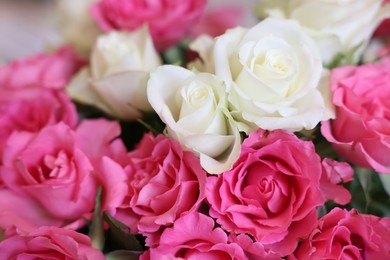 Beautiful bouquet of roses on blurred background, closeup