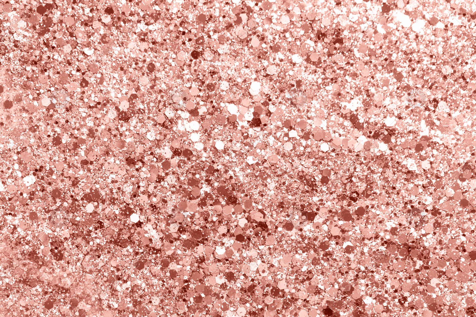 Photo of Beautiful pink shiny glitter as background, top view