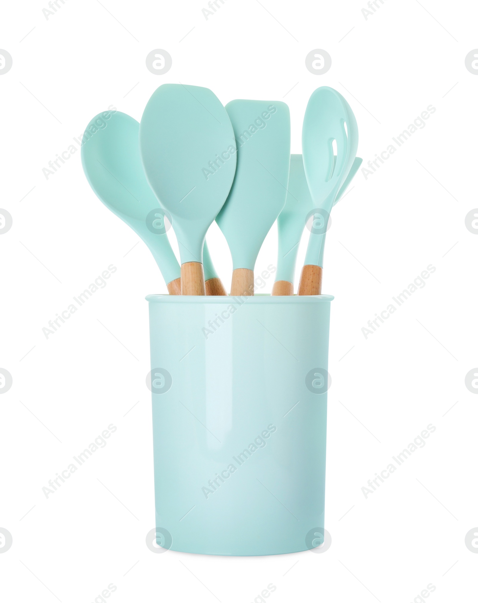 Photo of Set of turquoise kitchen utensils in holder isolated on white