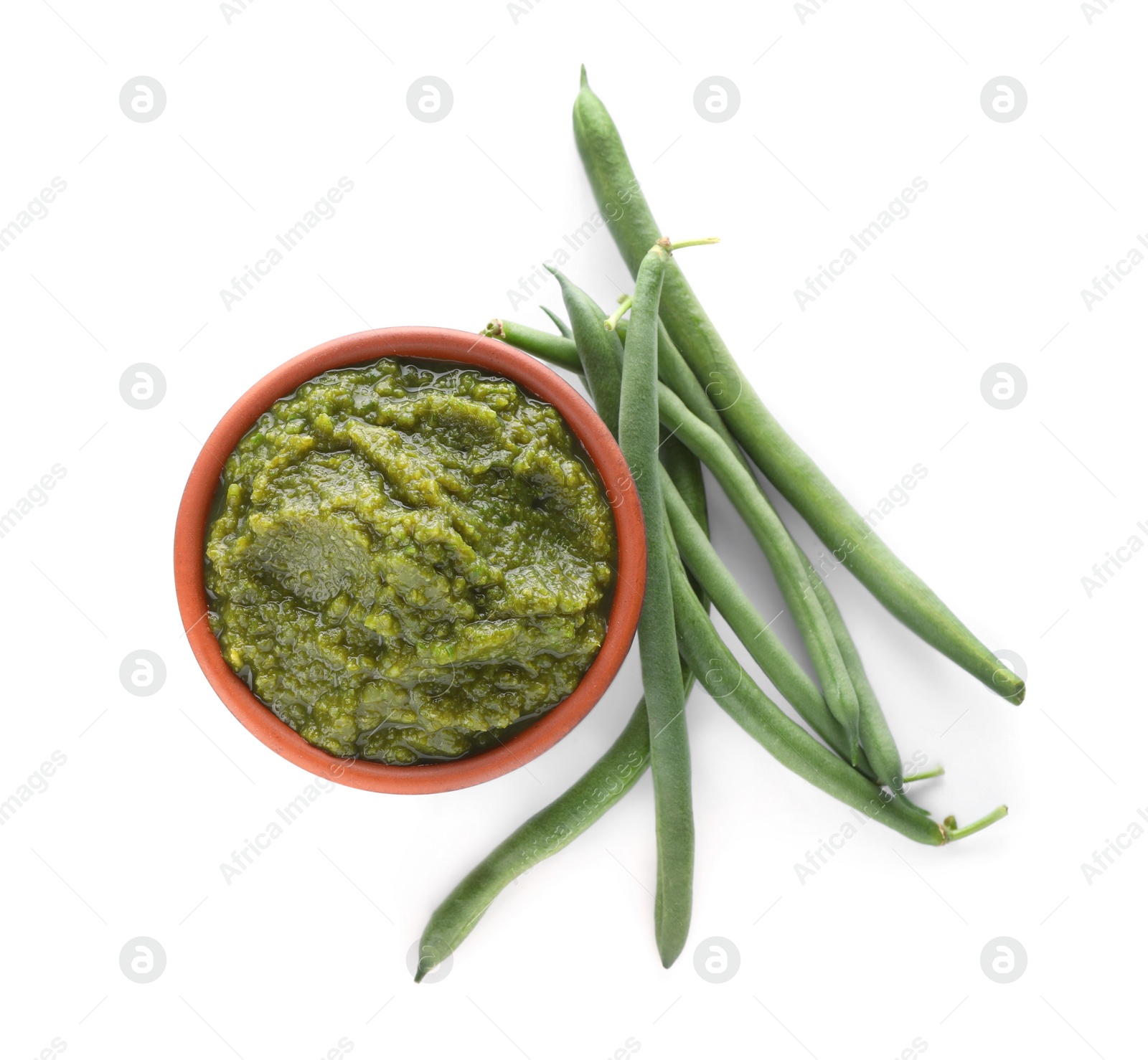 Photo of Delicious vegetable puree with green beans on white background, top view. Healthy food