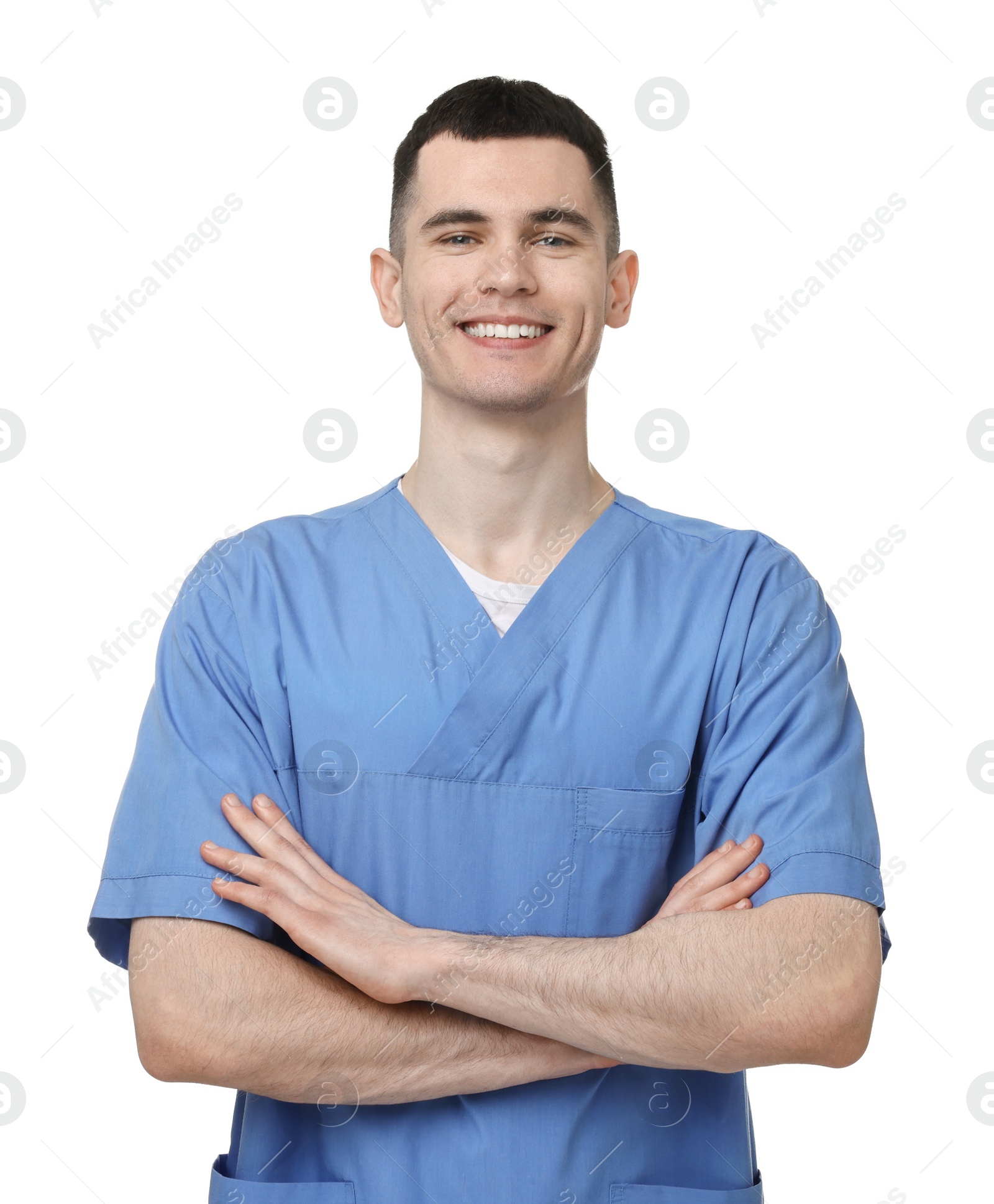 Photo of Portrait of smiling medical assistant with crossed arms on white background