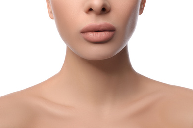 Woman with pink lipstick on white background, closeup