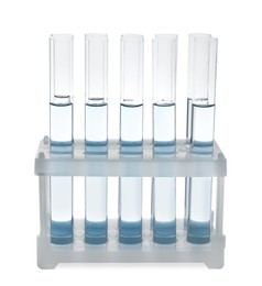 Image of Test tubes with light blue liquid in rack isolated on white