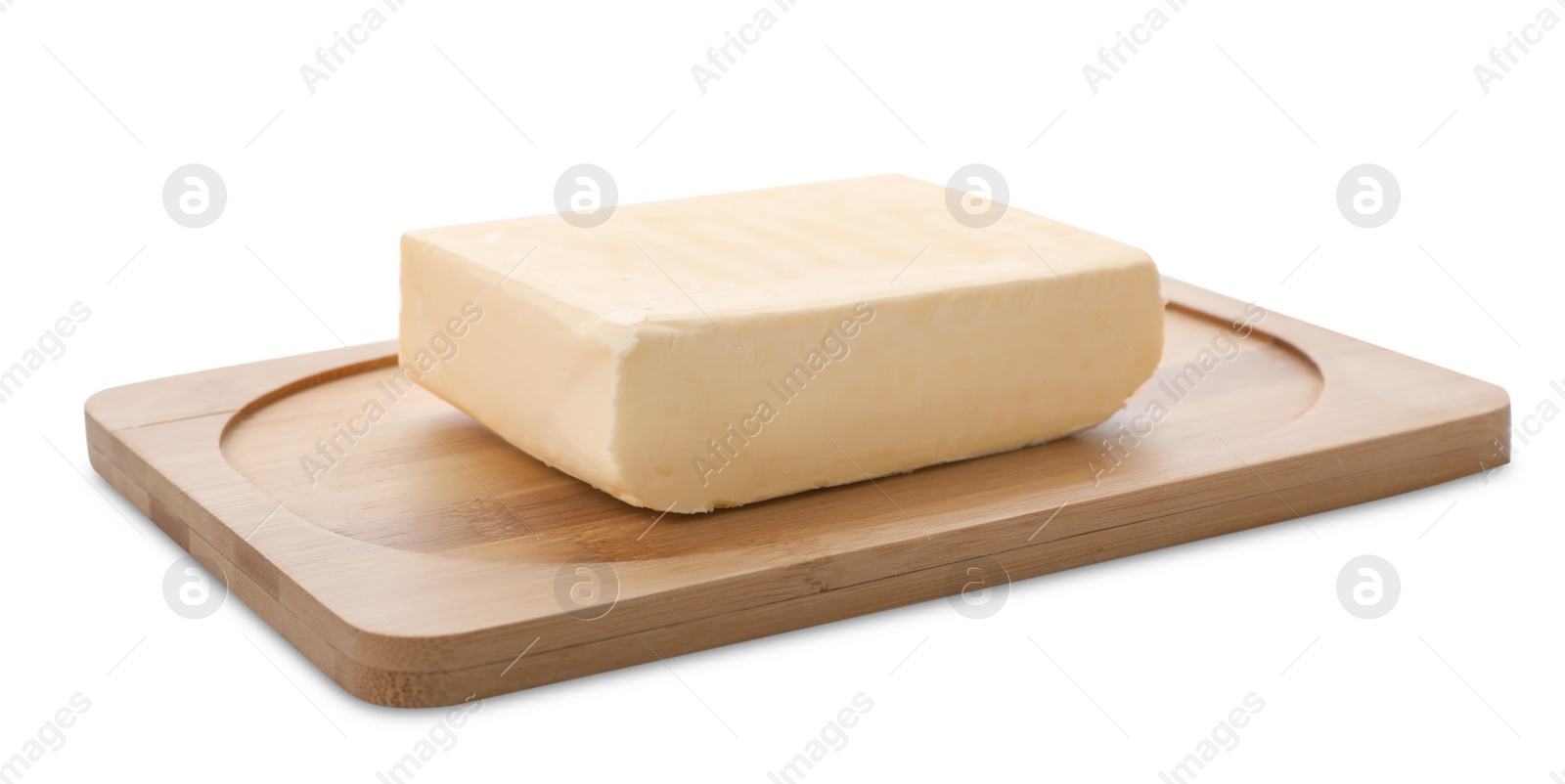 Photo of Wooden board with tasty fresh butter on white background