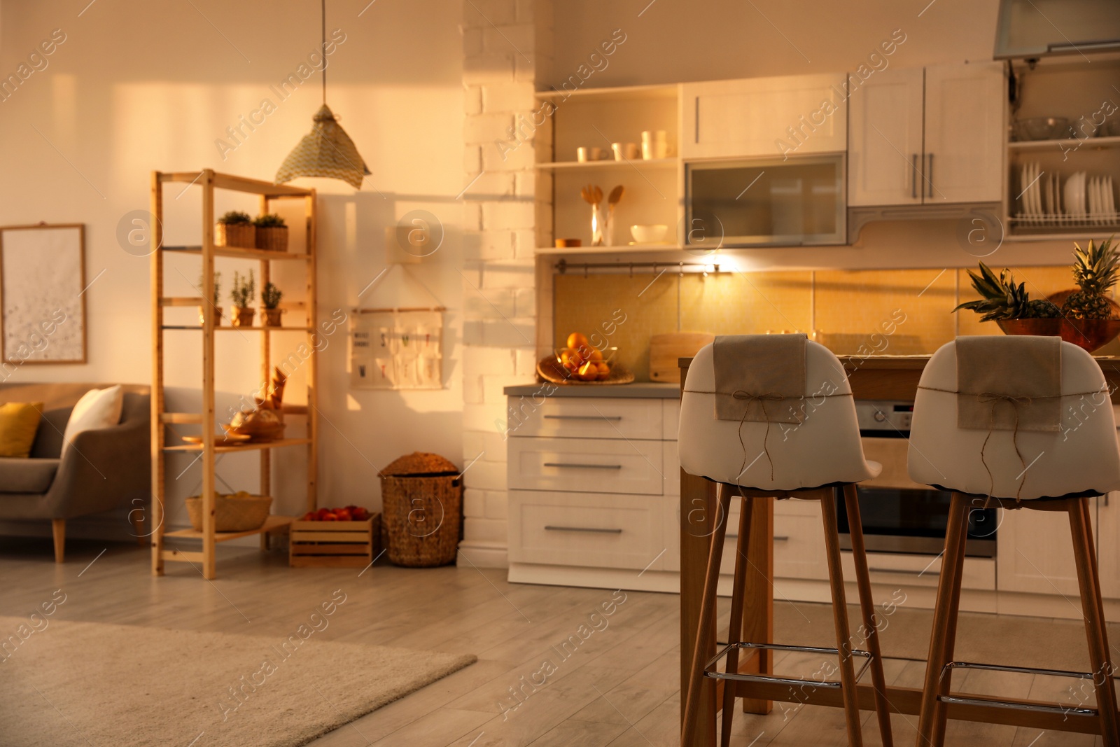 Photo of Modern kitchen interior with stylish wooden table. Space for text