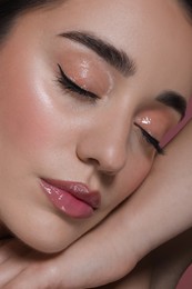 Portrait of beautiful young woman with perfect makeup, closeup