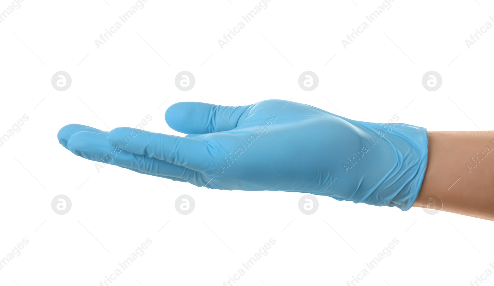 Photo of Person in blue latex gloves holding something against white background, closeup on hand