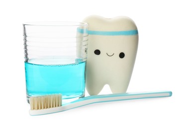 Photo of Mouthwash, toothbrush and holder on white background