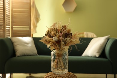 Bouquet of dry flowers and leaves in living room