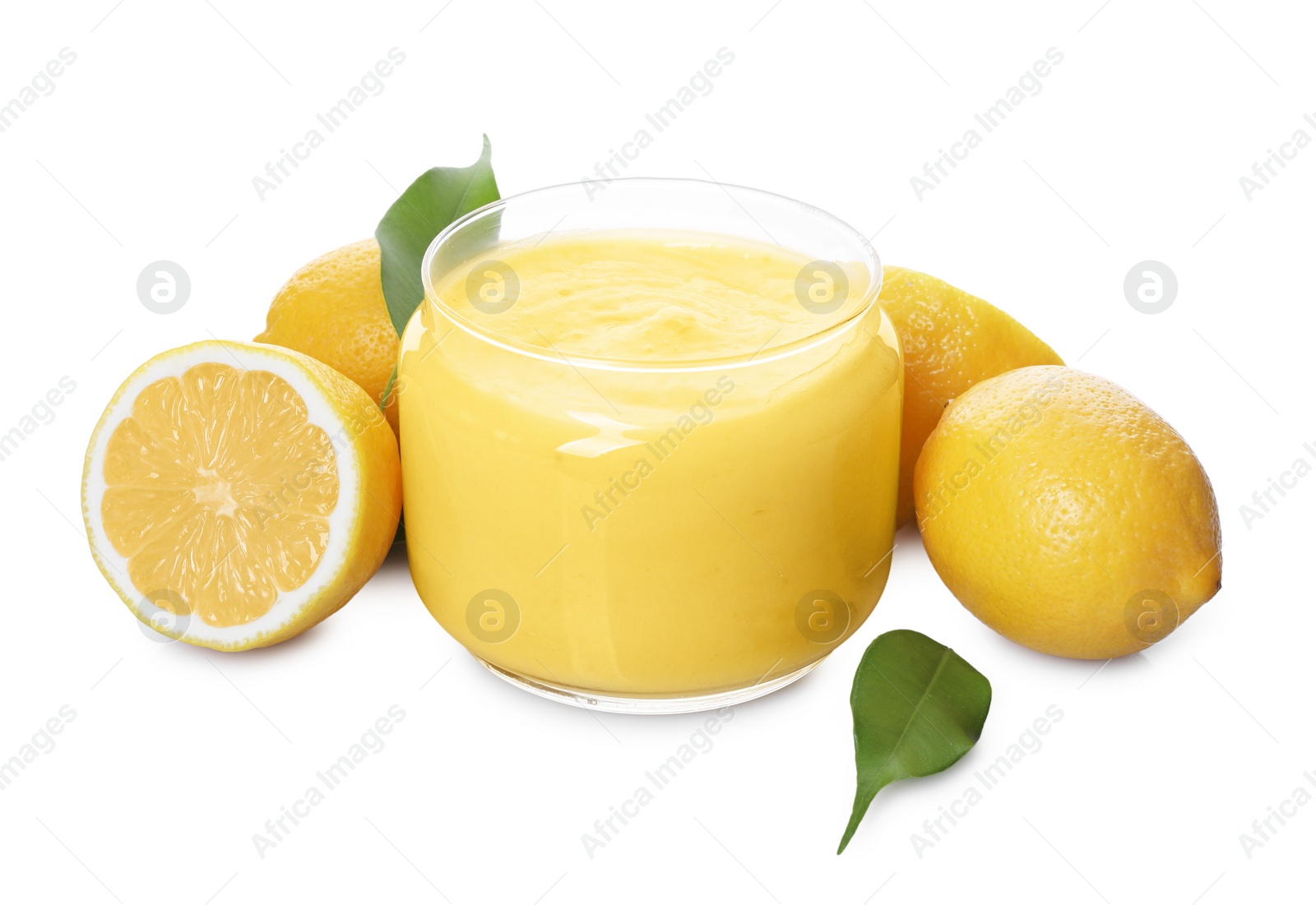 Photo of Delicious lemon curd in glass jar, fresh citrus fruits and green leaves isolated on white
