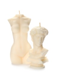Beautiful sculptural wax candles on white background