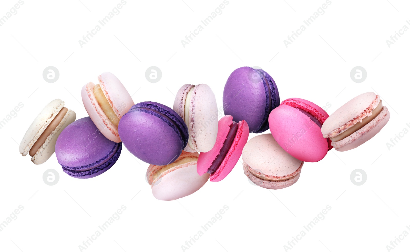 Image of Sweet delicious macarons flying on white background