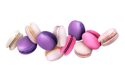 Image of Sweet delicious macarons flying on white background