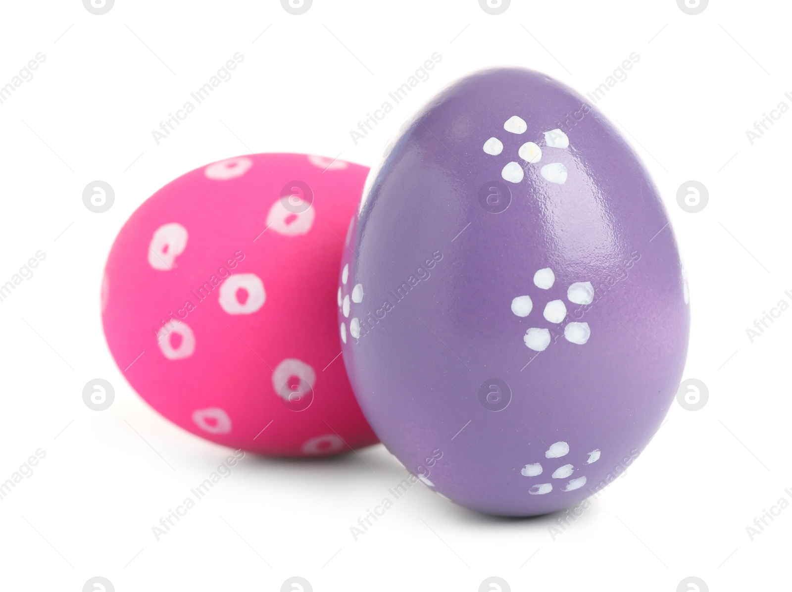 Photo of Colorful Easter eggs with different patterns isolated on white