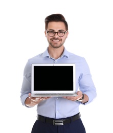 Young man with laptop on white background. Space for text