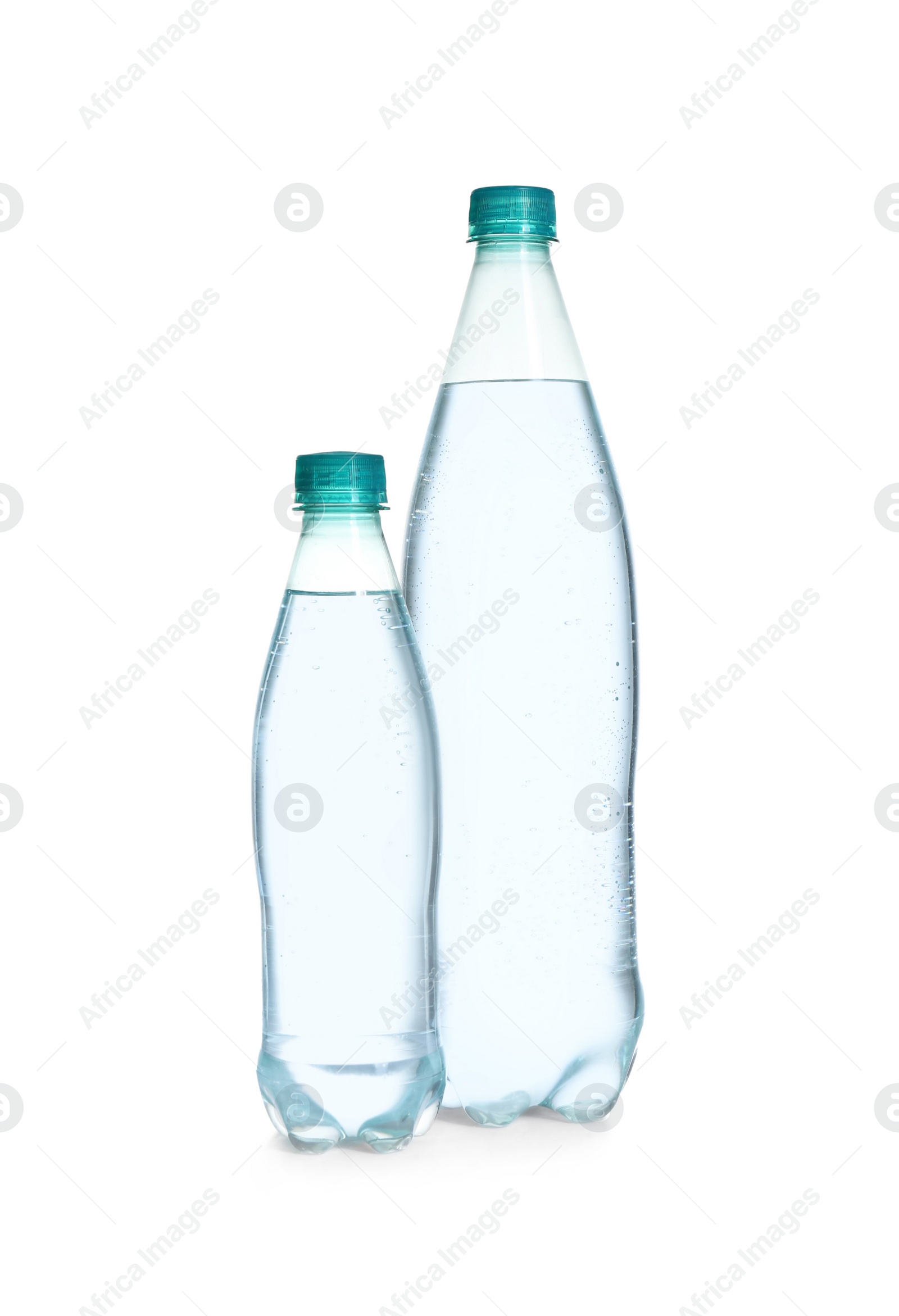 Photo of Plastic bottles with pure water on white background