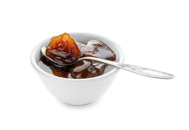 Photo of Bowl of tasty sweet fig jam and spoon isolated on white