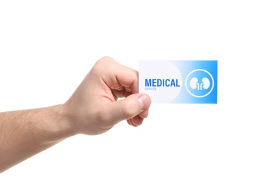 Photo of Man holding medical business card isolated on white, closeup. Nephrology service